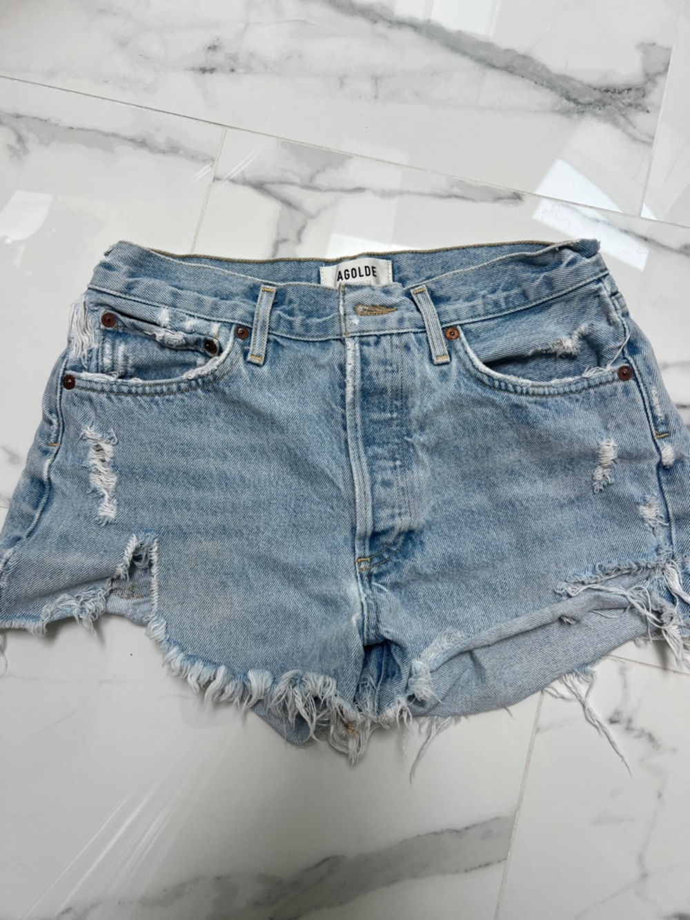 Agolde Light Wash Distressed Denim Cutoff Shorts size 25